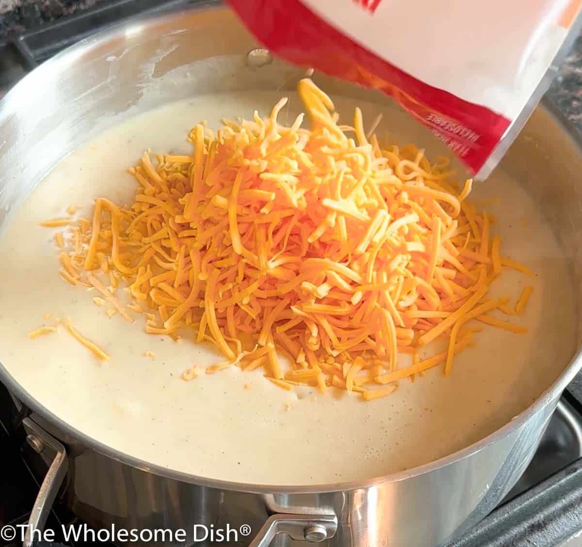 Cheddar Cheese Potato Soup Recipe - Amanda's Cookin' - Soup